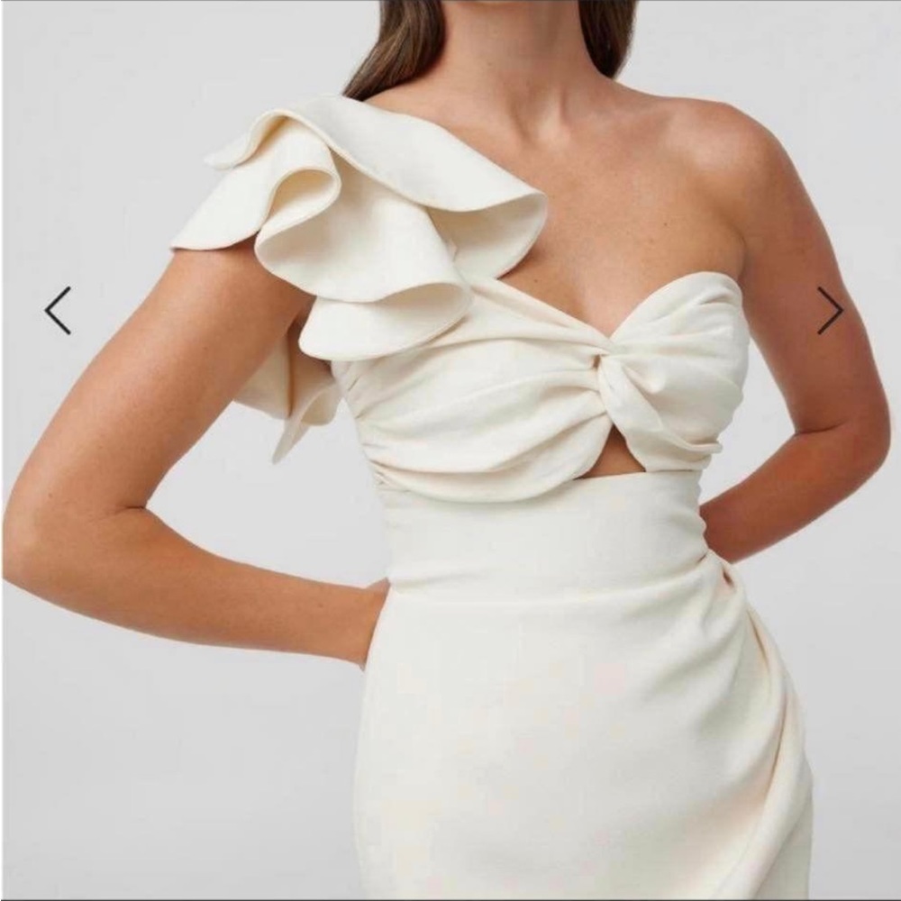 White cocktail one shoulder dress perfect for a bride.